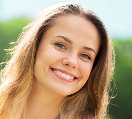 woman after a Smile Line Treatment
