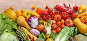 table with lots of vegetables