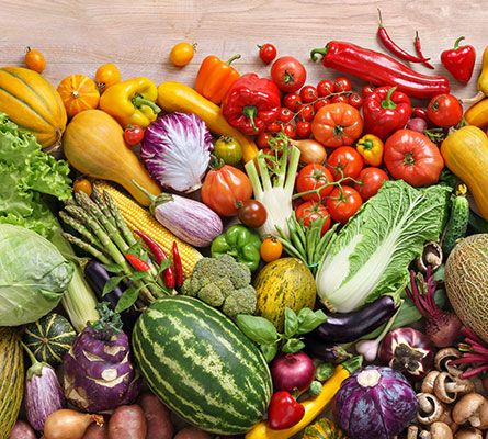 table with lots of vegetables