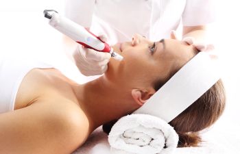 Woman Receiving Microneedling Treatment Atlanta GA