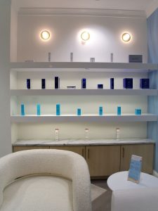 A display shelf with skincare products offered at The K Spa in Atlanta GA.