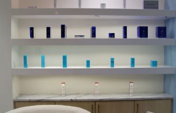 A display shelf with skincare products offered at The K Spa in Atlanta GA.