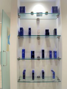A display shelf with skincare products offered for sale at The K Spa in Atlanta GA.