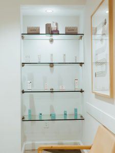 A display shelf with skincare products offered for sale at The K Spa in Atlanta GA.