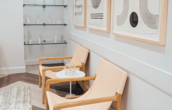 A waiting area and a display shelf with skincare products offered for sale at The K Spa in Atlanta GA.