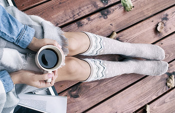 woman with cup of coffee